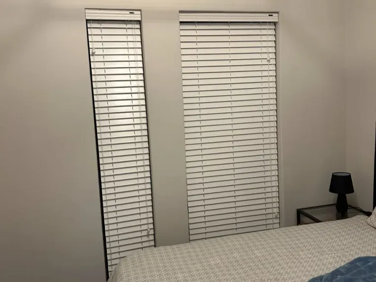 White venetian blinds fitted in a Cape Town bedroom