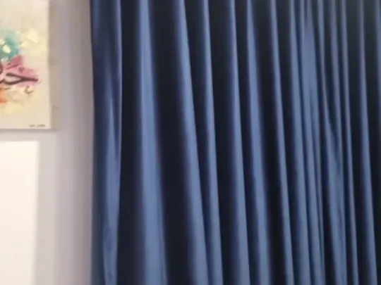Navy blue wave curtains fitted in a Cape Town lounge