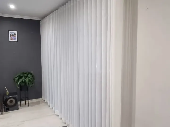 White sheer wave curtains in a Cape Town lounge