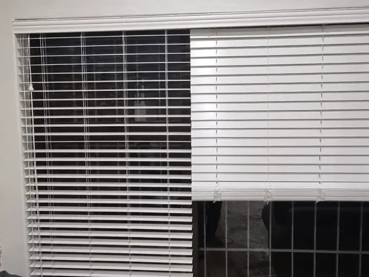White venetian blinds fitted in a Cape Town lounge