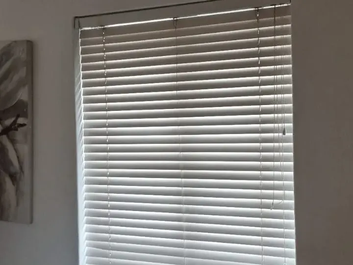 White venetian blinds fitted in a Cape Town lounge
