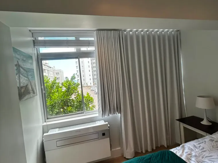 Grey wave curtains in a Cape Town bedroom